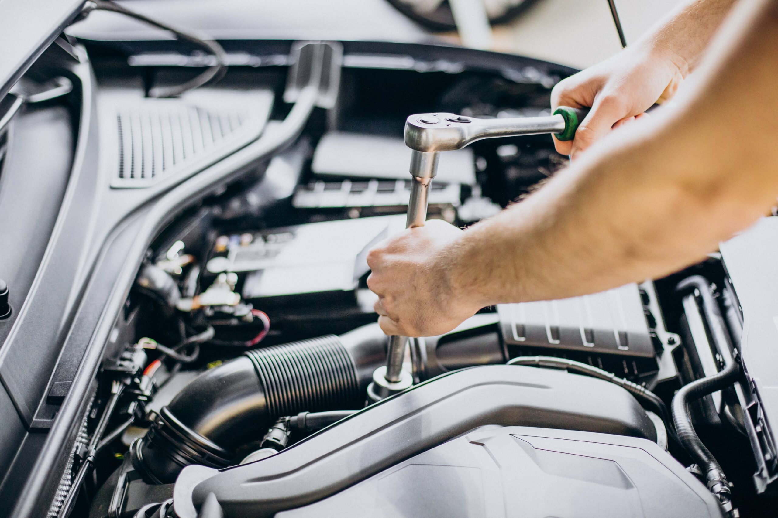 repair-man-making-car-service-min